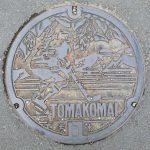 Plaque de la ville de Tomakomai figurant un joueur de hockey
